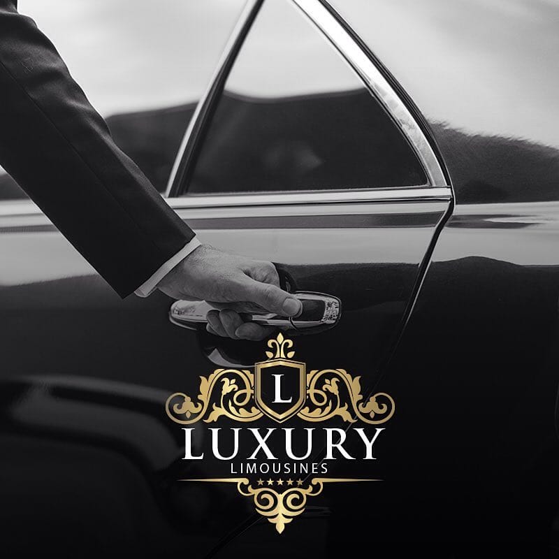 Professional chauffeur in suit opening luxury car door Las Vegas corporate transportation service